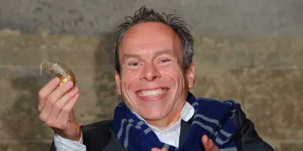 What is Warwick Davis net worth estimated? How did he get his fortune?
